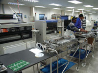 SMT line with feeder trolleys